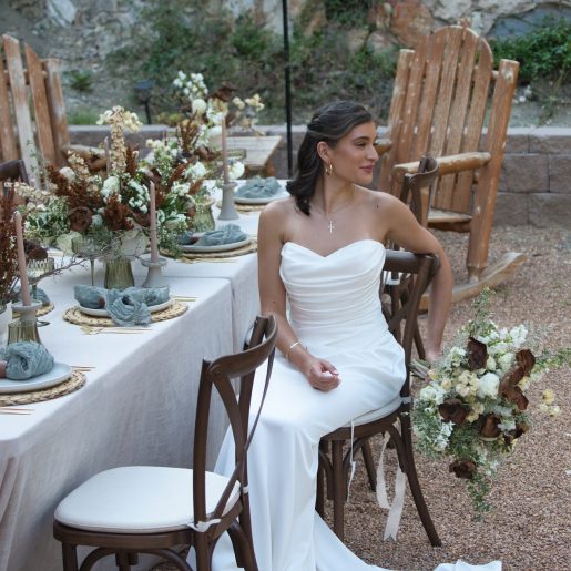 Bride at tablescape in garden